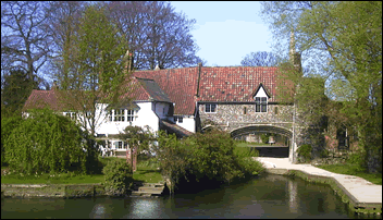 View of Pulls Ferry from the opposite bank of River Wensum